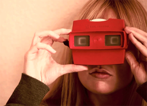 a lady using a ViewMaster